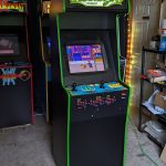galaga arcade machine standing in arcade shop
